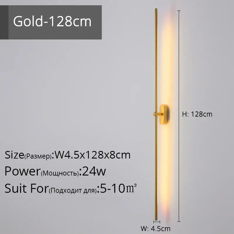Gold-colored sleek modern wall lamp with slim vertical led strip emitting warm light for bedroom decorbites led strip wall