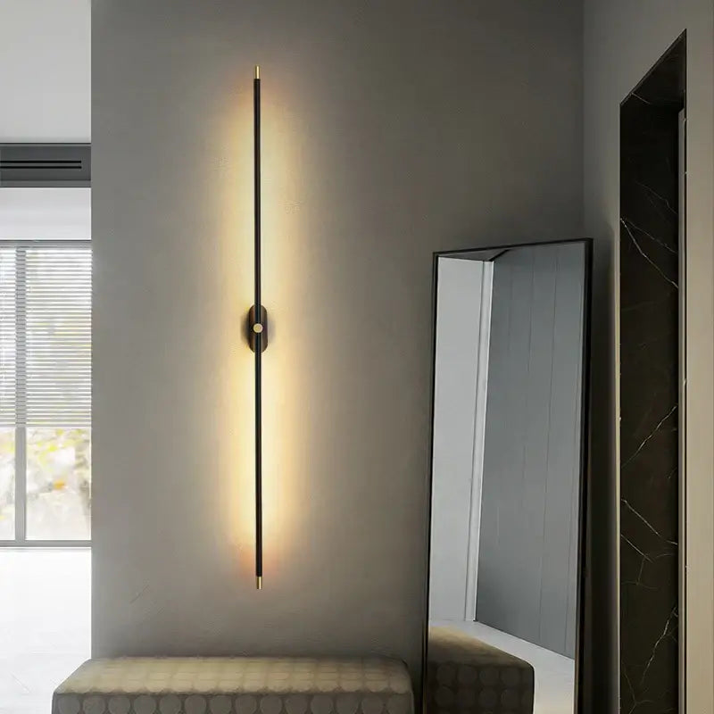 A modern black and gold wall lamp with a sleek led strip wall design for minimalist bedroom decorbites led strip lighting