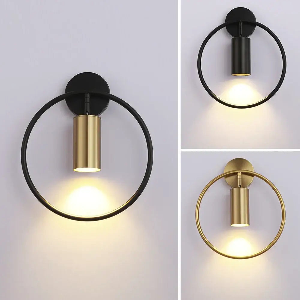 Modern black and gold led wall lamp featuring a sleek cylindrical light fixture for living room and bedroom use