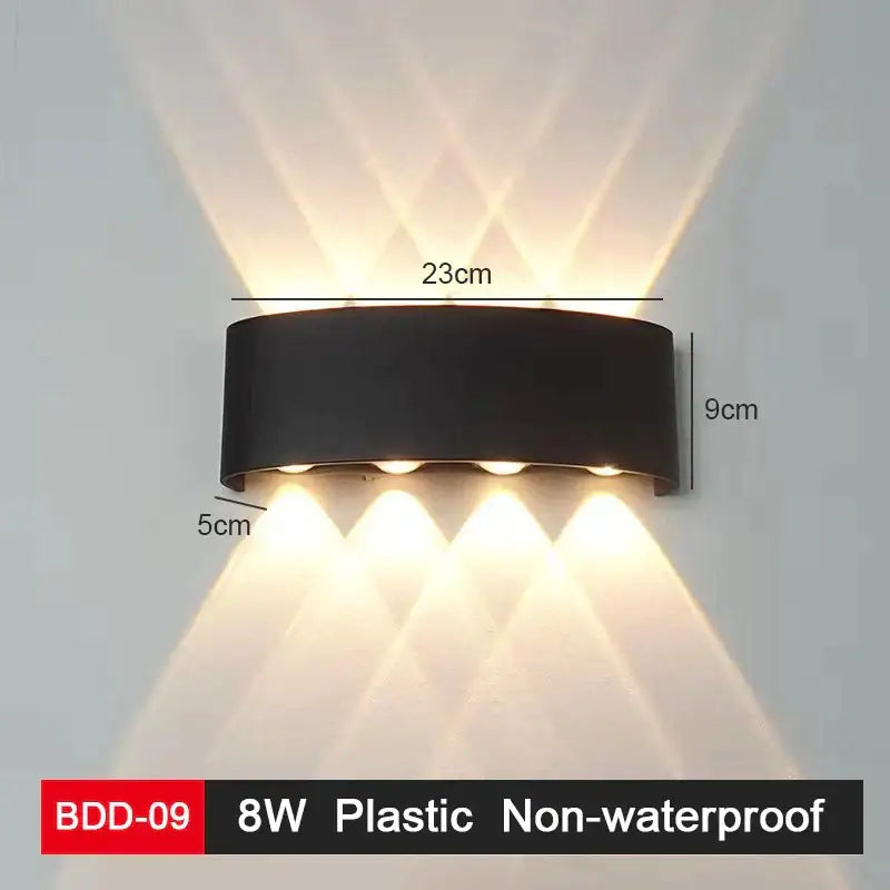 Modern black and gold led wall lamp with sleek geometric design and three warm angled beams decorbites led wall lighting
