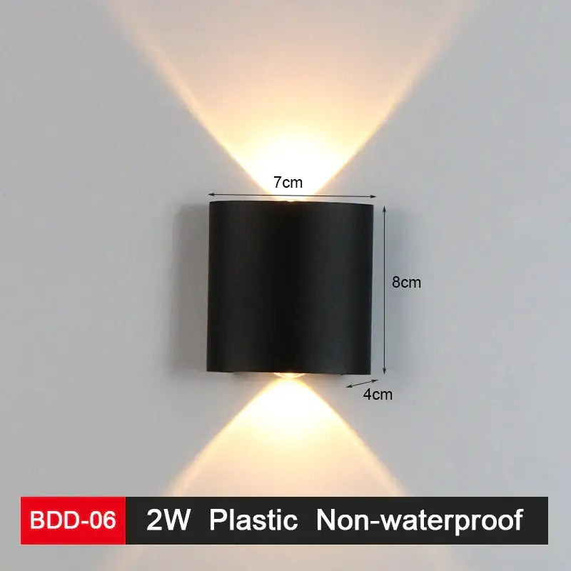Modern black and gold led wall lamp with sleek geometric design and dual angled warm white beams for living room decorbites led wall