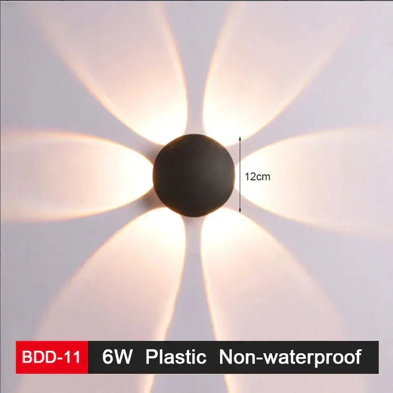 Modern black plastic wall lamp with six petal-shaped illuminated diffusers for sleek decorbites led wall lighting