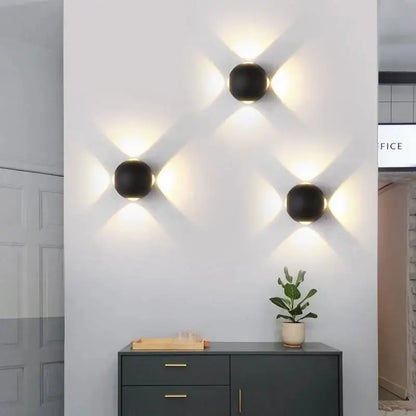 Modern black and gold led wall lamp with three sleek black spherical sconces for living room decorbites led wall lighting