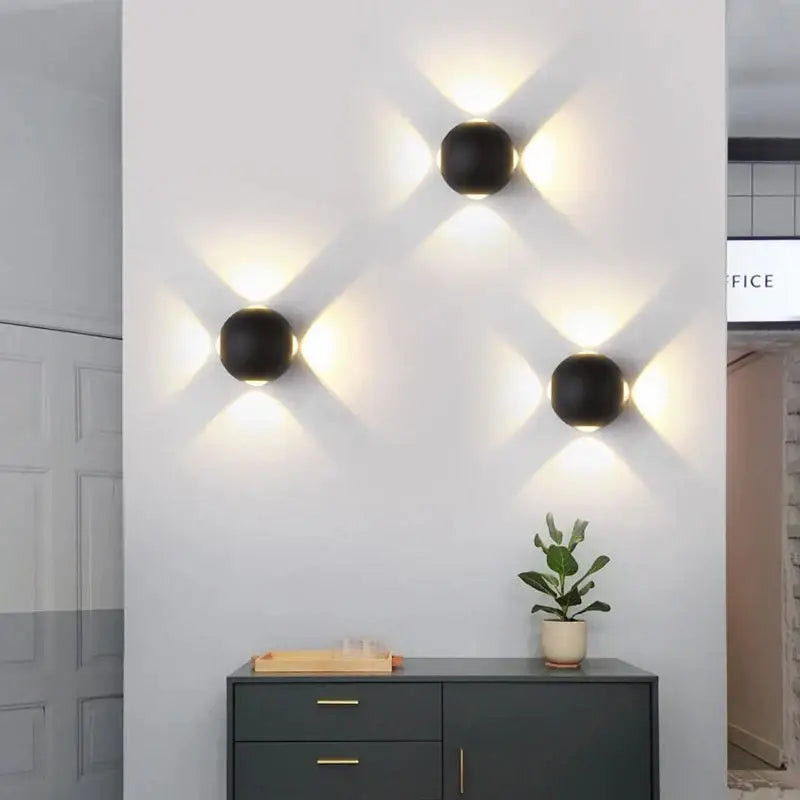 Modern black and gold led wall lamp with three sleek black spherical sconces for living room decorbites led wall lighting