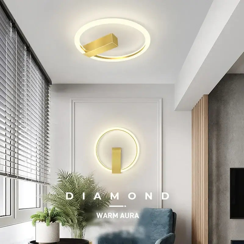 Modern black and gold led wall lamp with gold-toned circular ceiling and wall-mounted fixtures for living room