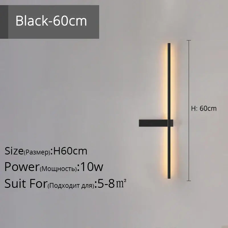 Modern black and gold led wall lamp with a sleek vertical bar and warm light for minimalist living room decor