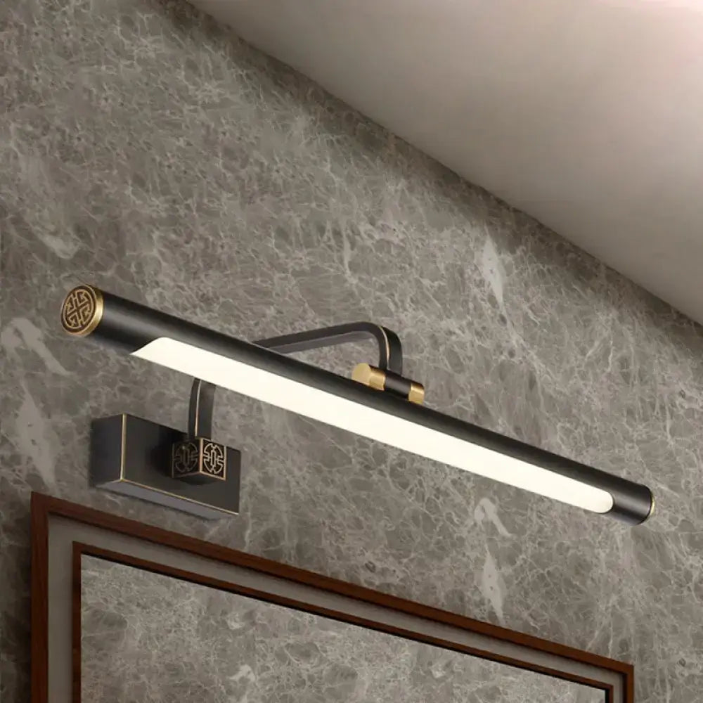 Modern black and gold wall light with bronze finish featuring vintage style ornate motifs for bathroom vanity use