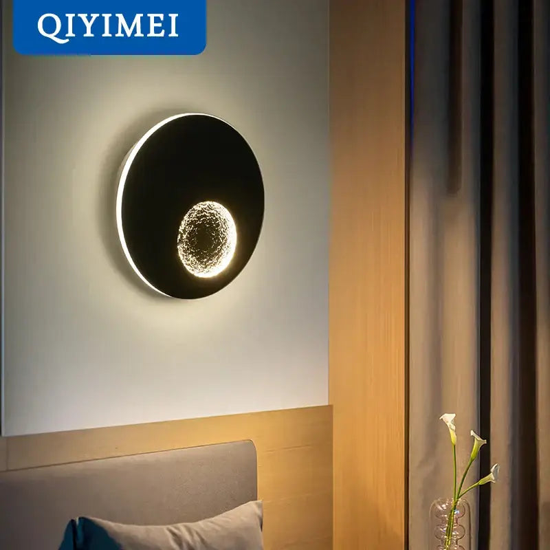 Modern black and gold led wall lights featuring a circular sconce with glowing textured center for bedroom decorbites led wall use