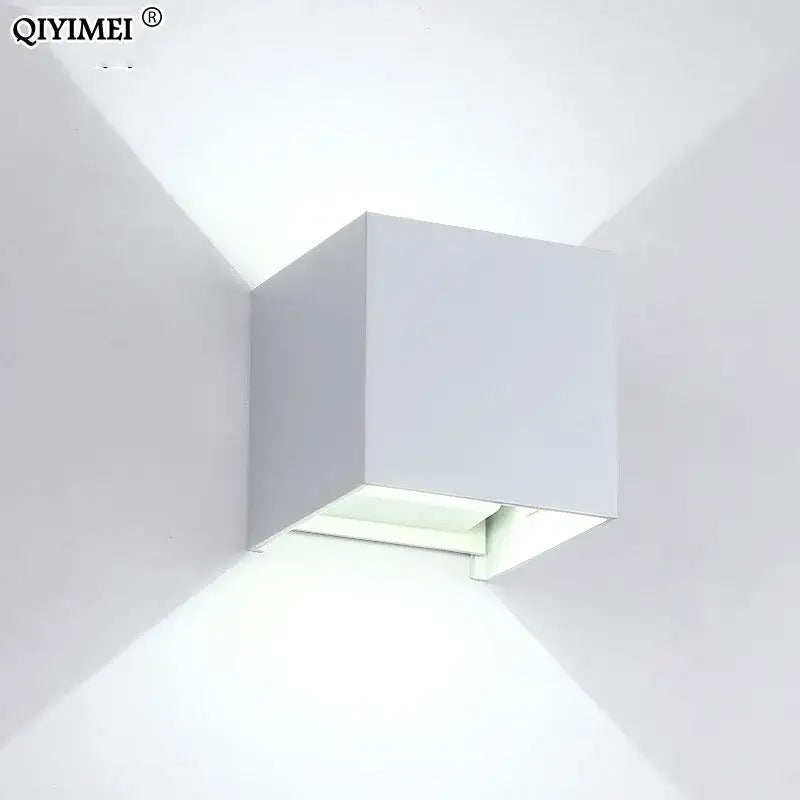 White cube-shaped decorbites led wall light fixture with modern minimalist design for indoor and outdoor use