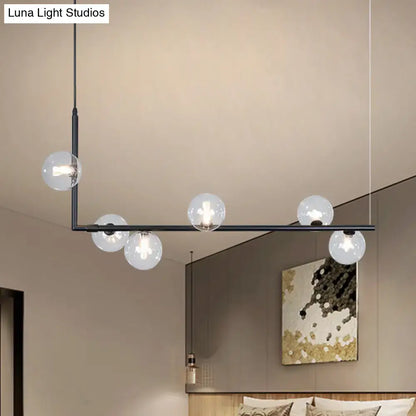 Modern black gold linear chandelier with five clear glass globe bulbs for dining room or kitchen island lighting