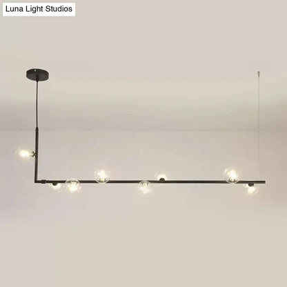 Modern black gold linear chandelier with clear glass globe bulbs for dining room or kitchen island lighting