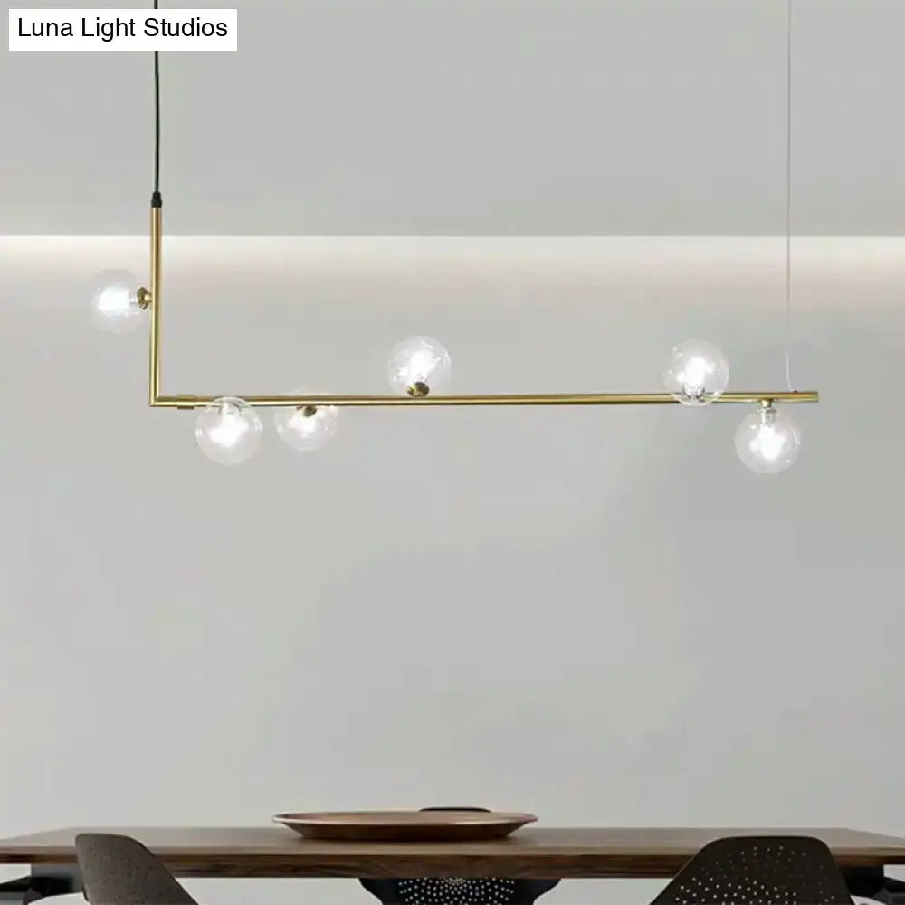 Modern black gold linear chandelier with brass pendant light and five clear glass globe bulbs for dining room island lighting