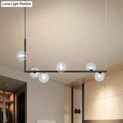 Modern black gold linear chandelier with five clear glass globe bulbs for dining room or kitchen island lighting