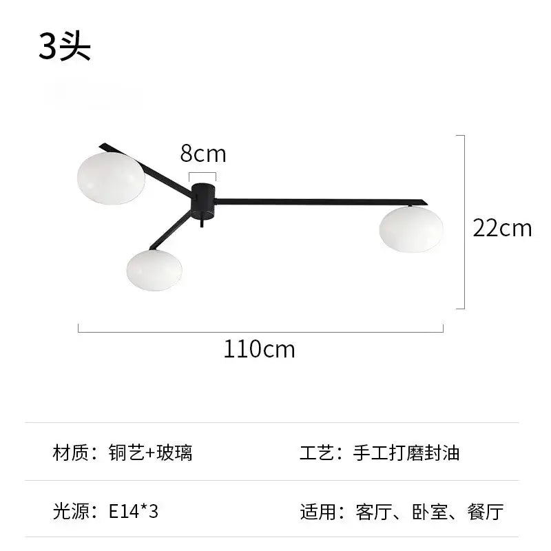 Modern black metal and gold lustre ceiling light with three frosted glass globes for kitchen use light fixture
