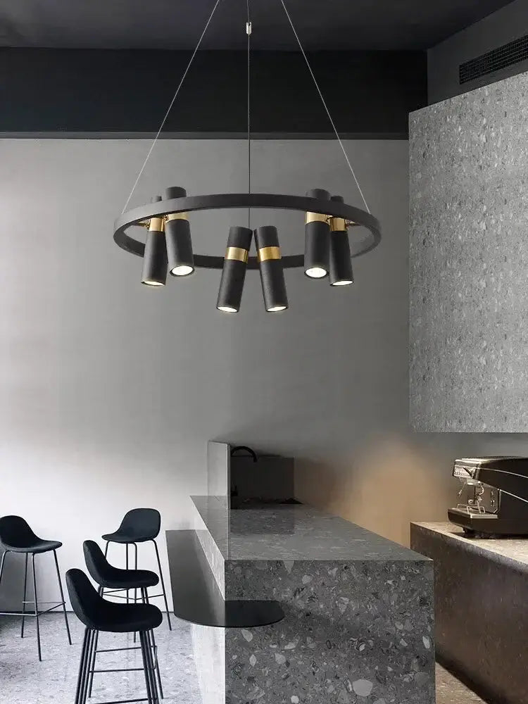 Modern black metal circle pendant light with gold accents and cylindrical bulbs for kitchen decorbites black metal style