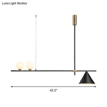 Modern black and gold metal cone island light featuring two frosted glass bulbs and a conical shade for dining room