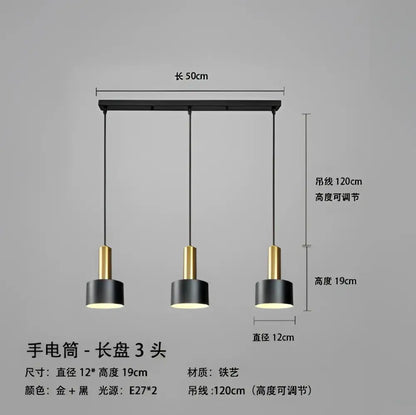 Modern black and gold three-head pendant light with metal finish designed for kitchen with brushed nickel accents