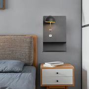 Modern metal wall light in black and gold with usb port designed for living room use with metal wall mounting