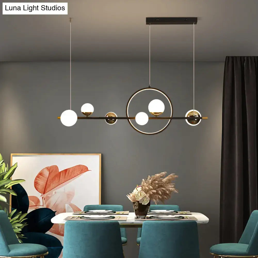 DecorBites™ modern black acrylic sphere led pendant light with gold accents ideal for restaurants