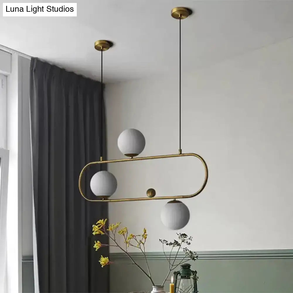 Decorbites™ modern opal glass oblong chandelier with black gold brass frame and three matte white shades for dining room lighting