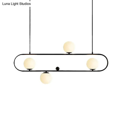 Modern black gold metal pendant light with four frosted opal glass globes for dining room with led or incandescent use
