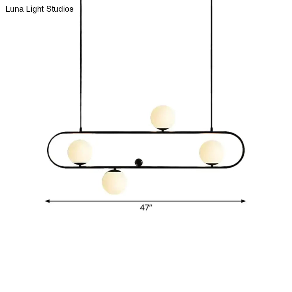 Modern black gold metal pendant light with four frosted opal glass globe bulbs for dining room LED lighting