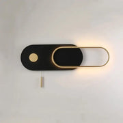 Modern black and gold oval led wall lamp with sleek minimalist design featuring an illuminated frame for bedroom sconce
