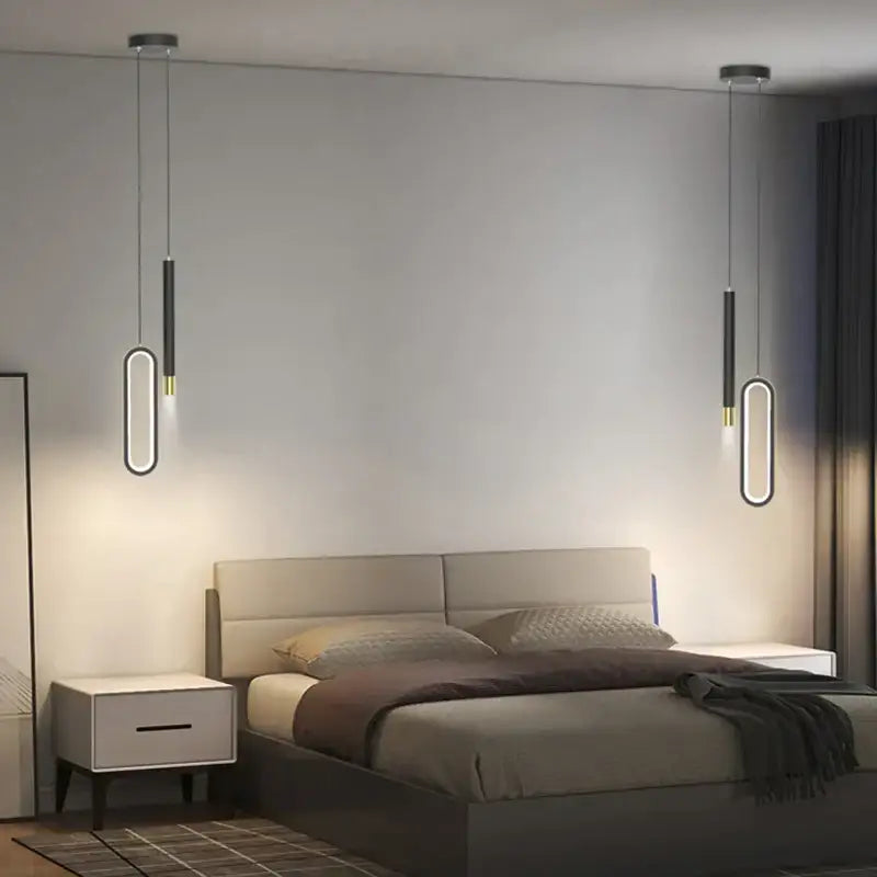 Modern black and gold oval pendant lamps with sleek design for minimalist bedroom lighting by decorbites black pendant lamps