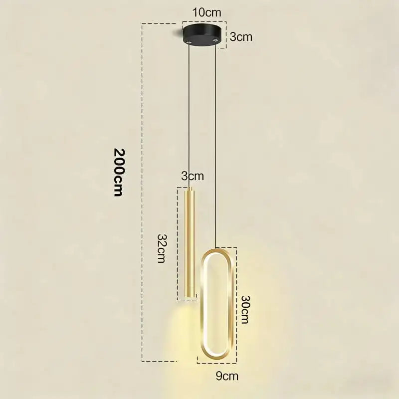 Modern black and gold pendant light with a sleek oval design and white light source for dining room use