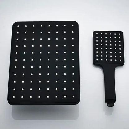 Modern black rainfall shower head with square matte finish and white nozzles plus matching handheld unit