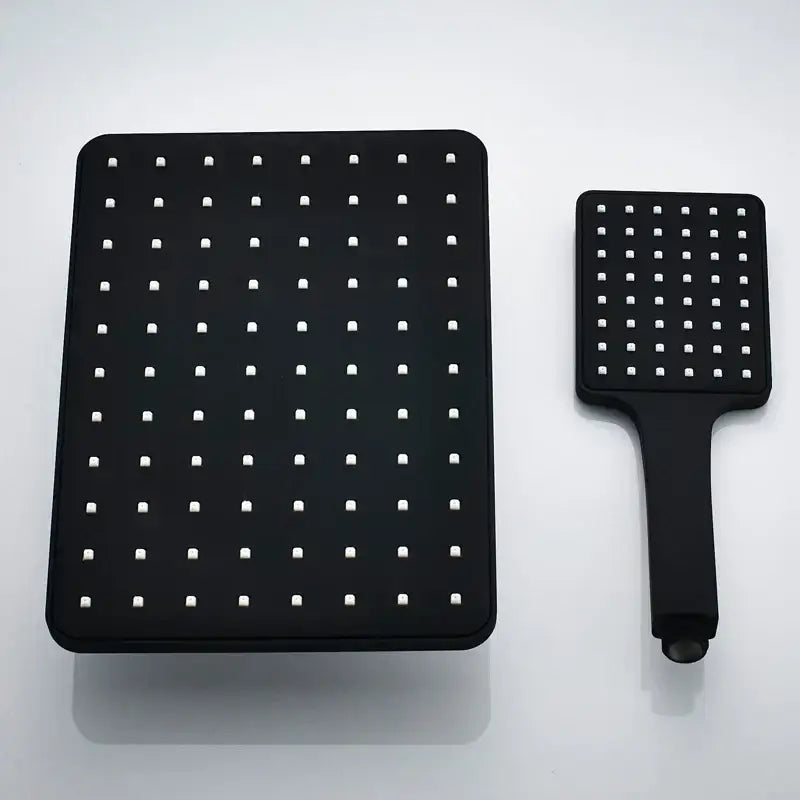 Modern black rainfall shower head with square matte finish and white nozzles plus matching handheld unit