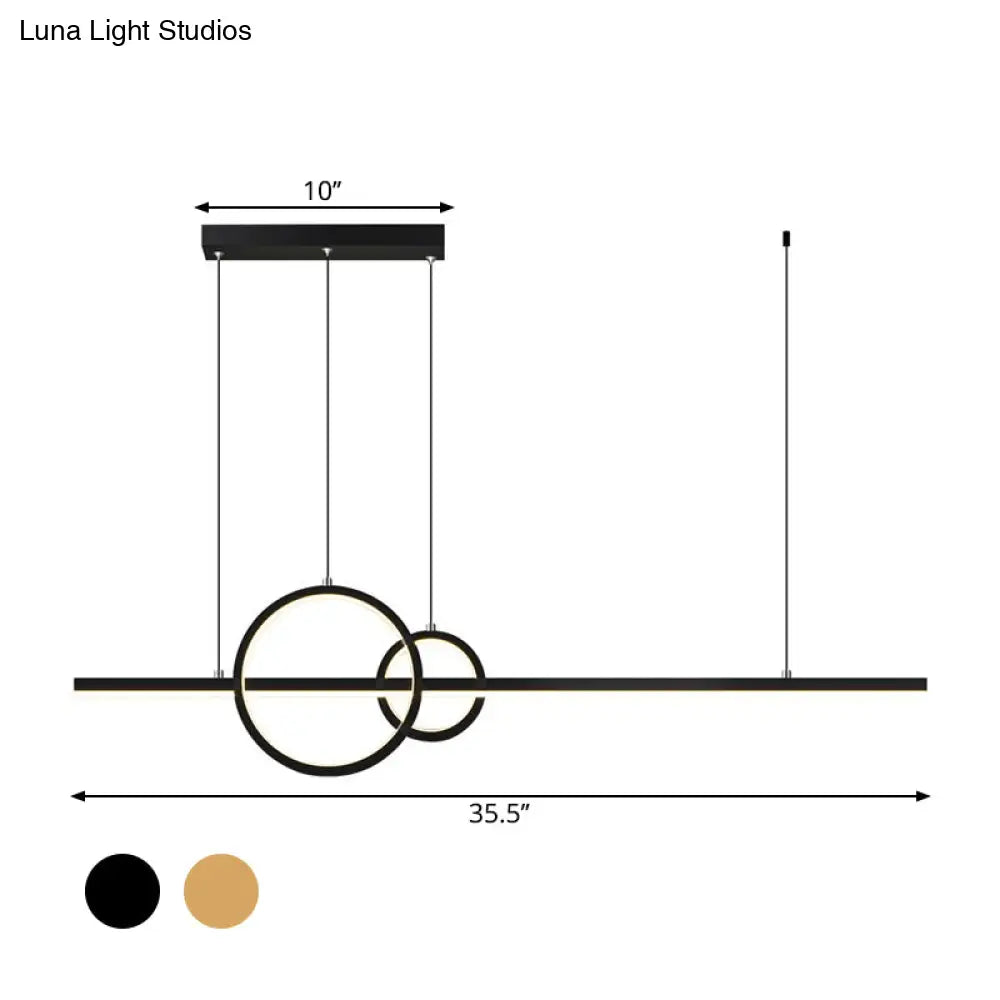 Lámpara colgante LED metálica moderna DecorBites™ con anillo y barra en negro y dorado para una iluminación de cocina minimalista