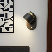 Modern black and gold rotatable led light bedroom wall sconce with matte finish and adjustable design
