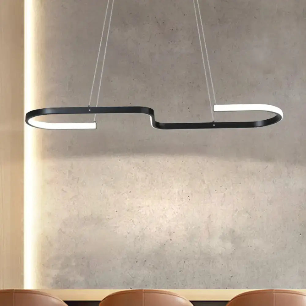 Modern black gold chandelier lamp with sleek curved design featuring warm white led lights for dining room decor