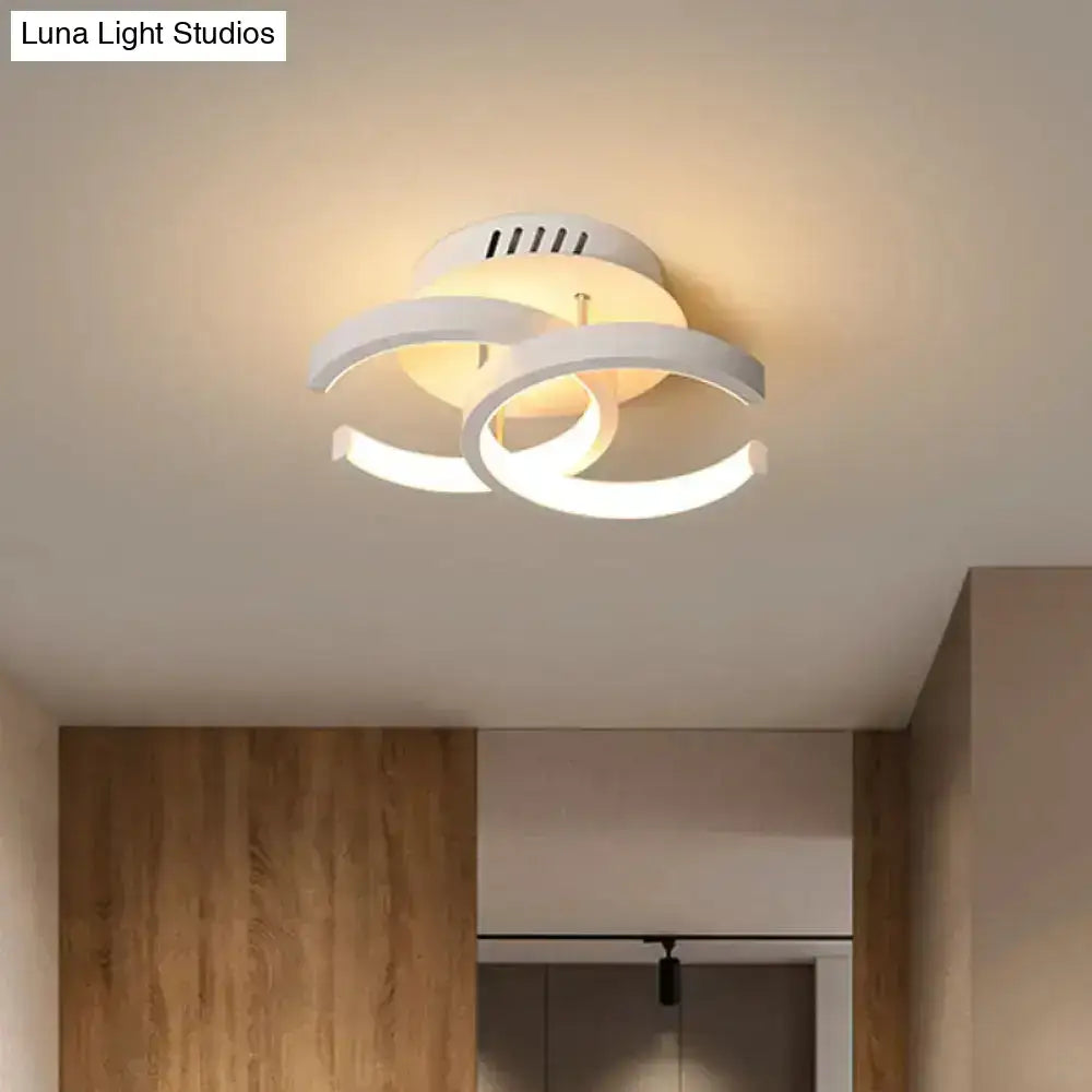 Modern black and gold spiral ceiling lamp featuring white led rings with exceptional lighting efficiency for corridors