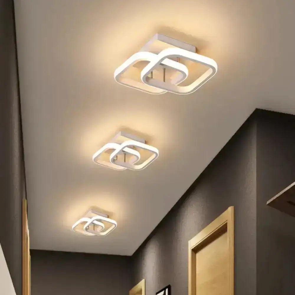 Modern white square ceiling lamp with interlocking geometric design offering exceptional lighting efficiency for corridors