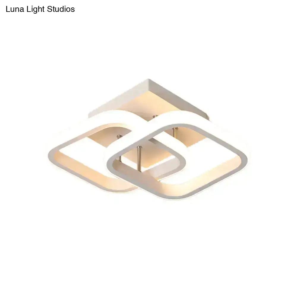 Modern black and gold ceiling lamp with intersecting square frames and warm glow for exceptional lighting efficiency