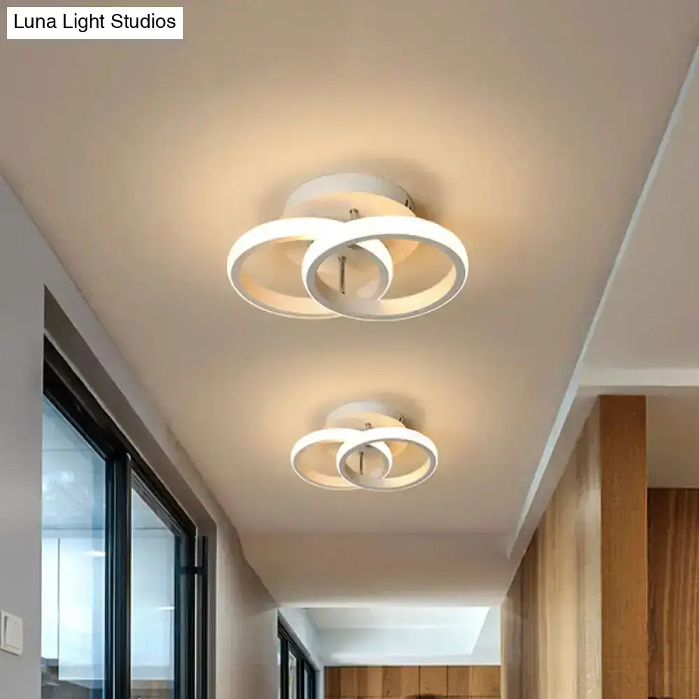 Modern white circular led ceiling lamp with intersecting rings offering exceptional lighting efficiency for round square moon design