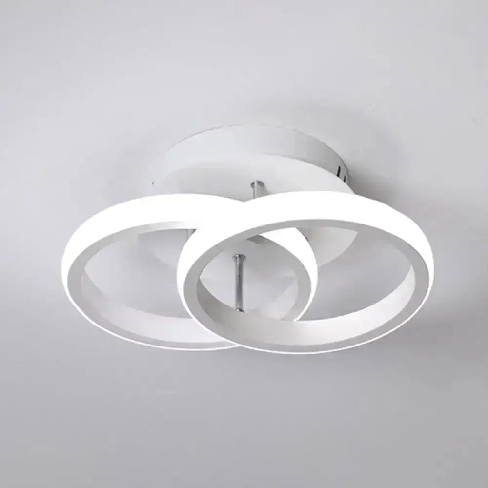 Modern white led ceiling lamp with two interlocking circular rings offering exceptional lighting efficiency for corridor use