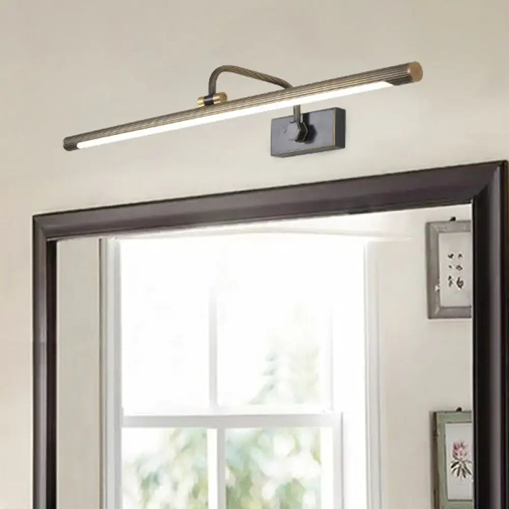 A modern black and gold swing arm wall light with a brushed brass finish and rectangular black mounting plate vanity light