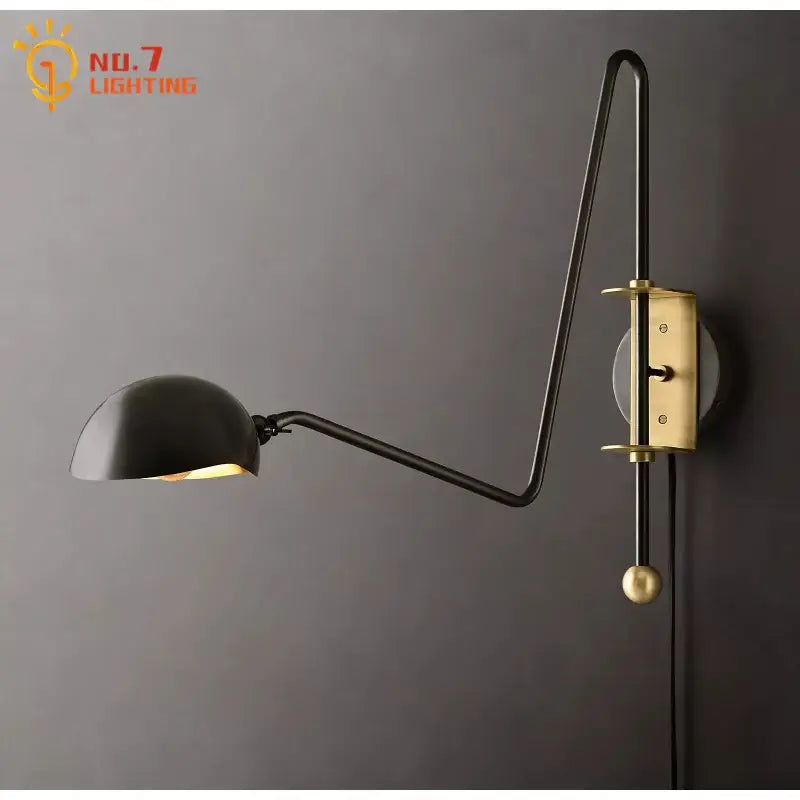 Modern black and gold swing arm wall lamp with black and brass articulated arm and spherical knob for living room decorbites black gold
