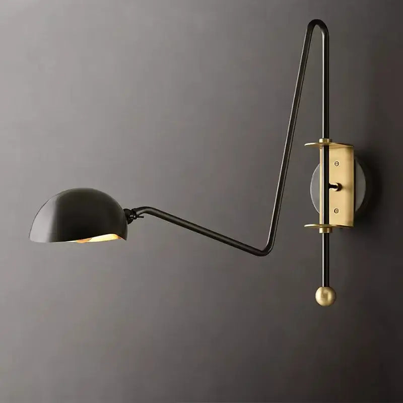 Modern black and gold swing arm wall lamp with black and brass articulated arm and spherical finial for living room decorbites black gold
