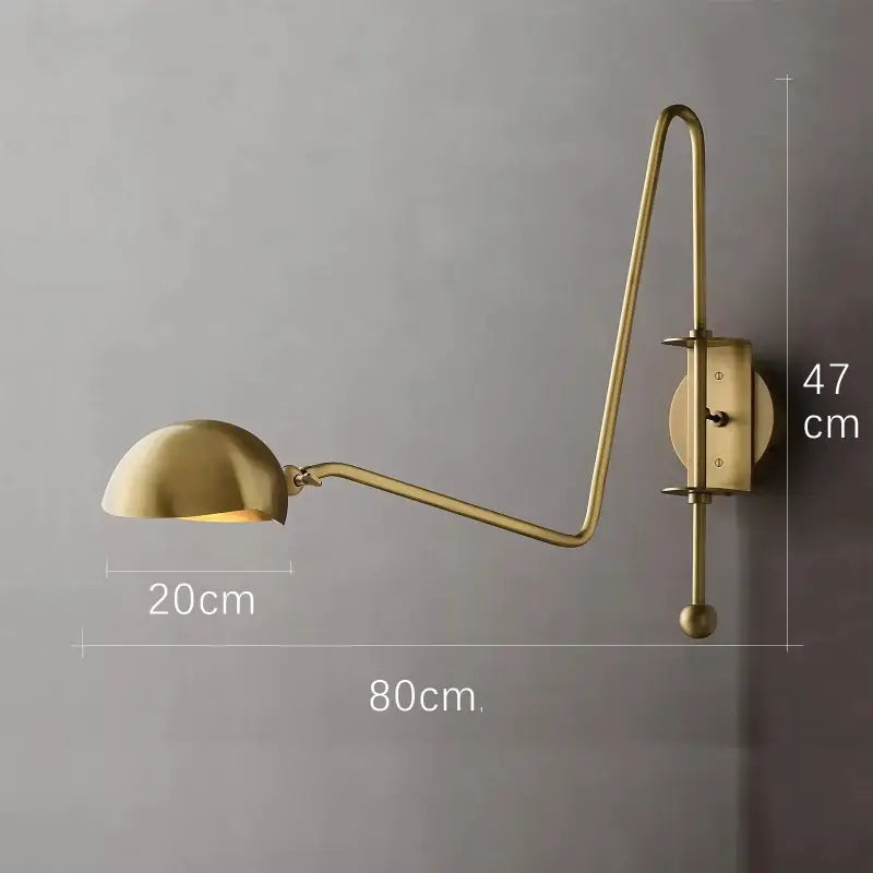 Brass-finished adjustable wall lamp with curved swing arm and dome shade in decorbites black gold for living room decor