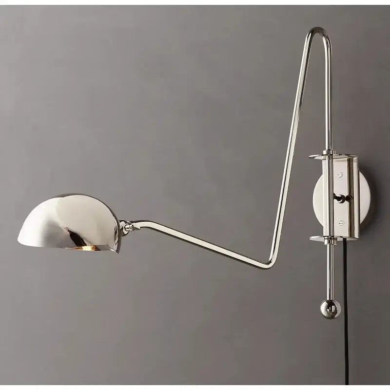 Polished chrome wall lamp with sleek swing arm and dome shade in decorbites black gold for modern living room decor