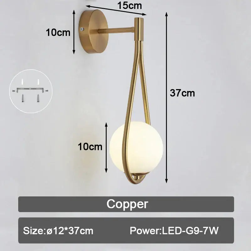 Modern black and gold led wall sconce with a sleek copper curved arm and frosted glass globe shade for bedroom lighting