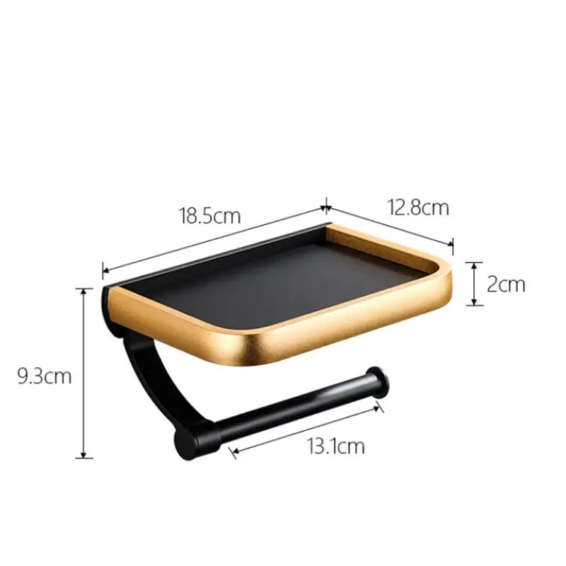 Modern black and gold tissue paper holder with sleek tray design for bathroom use as a paper holder and phone rack