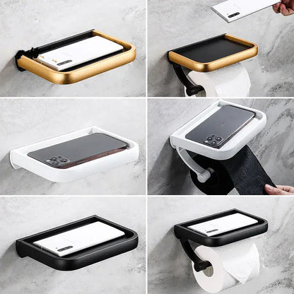 Modern black and gold wall-mounted tissue paper holder with phone tray for bathroom use