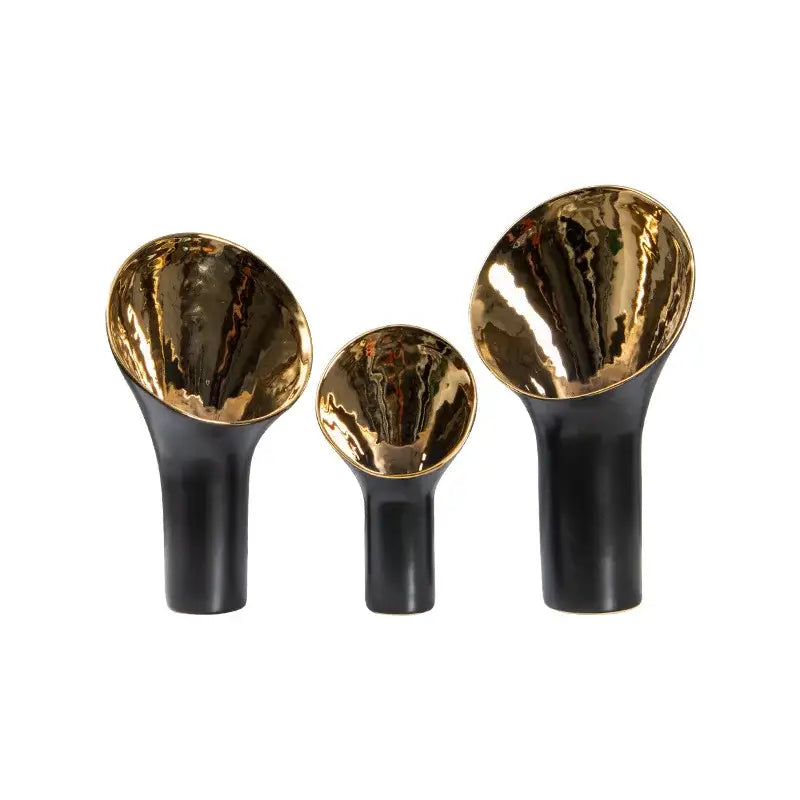 Set of three modern black and gold trumpet ceramic flower vases with reflective gold interiors for living room decorbites golden trumpet decor
