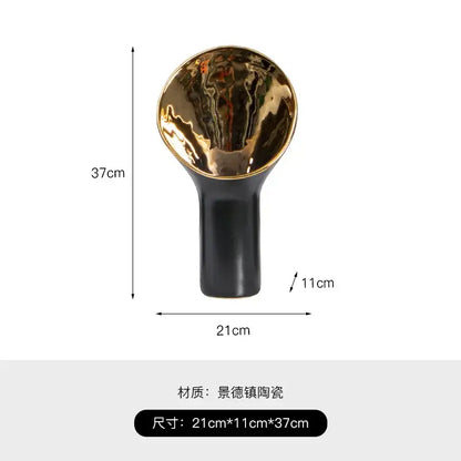 Modern black and gold trumpet ceramic flower vase with glossy reflective interior for living room decorbites golden trumpet decor