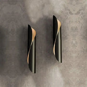 Modern black and gold twisted wall sconce light with sleek design ideal for corridor wall sconce lighting